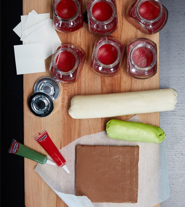 A bird’s-eye view of the ingredients for eyeball treats laid out on baking surface.