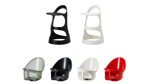 A black and white high chair side by side with four different color seats.