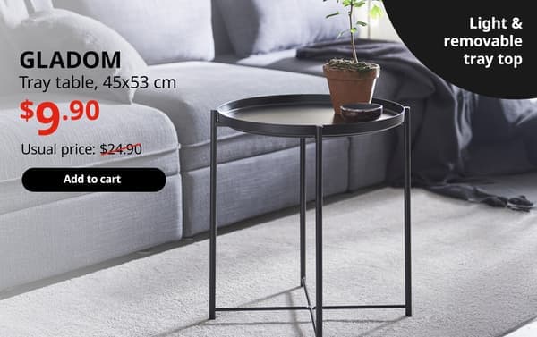 A black GLADOM tray table. On the top left-hand corner, black text that reads 