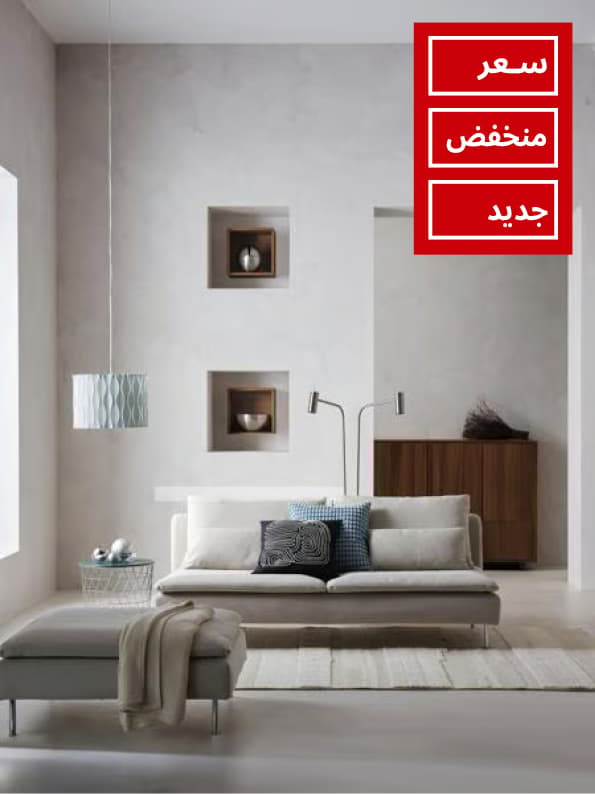 A black/white BRUNBRÄKEN cushion cover