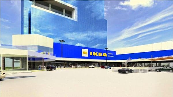 A blue IKEA store building with a giant IKEA logo in yellow.