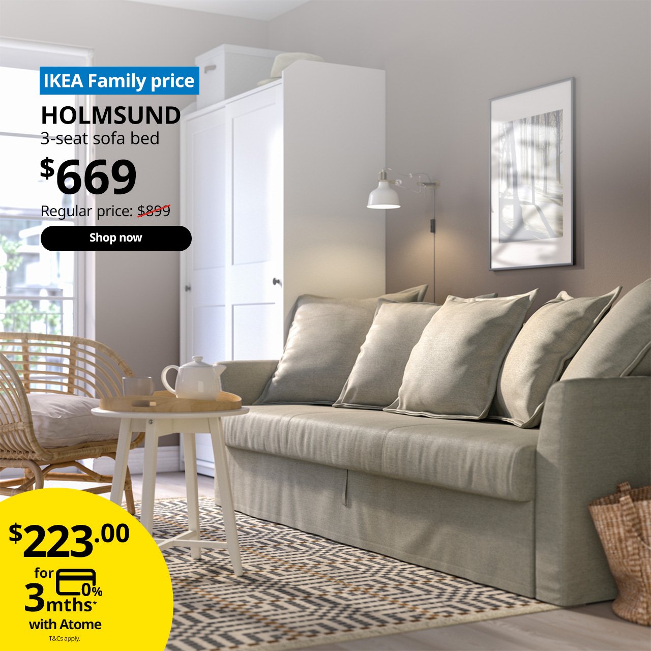 A borgunda beige HOLMSUND 3-seat sofa bed in a studio apartment setting. A blue tag with white text that reads "IKEA Family price", followed by black text overlaying the image that reads "HOLMSUND, 3-seat sofa bed, $669, Regular price $899".
