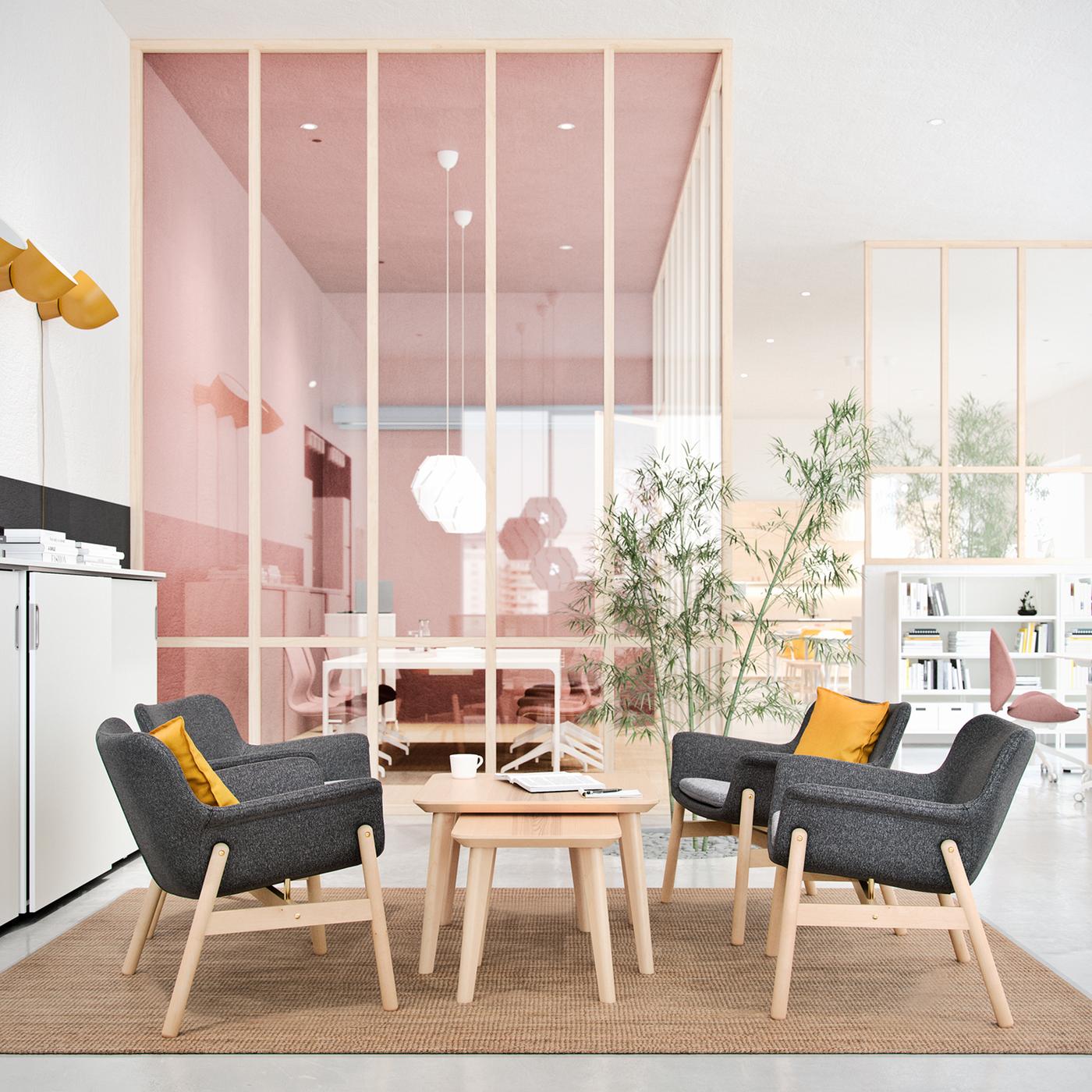 A bright and airy office space with a sitting area comprised of four dark grey VEDBO armchairs and two LISABO coffee tables.
