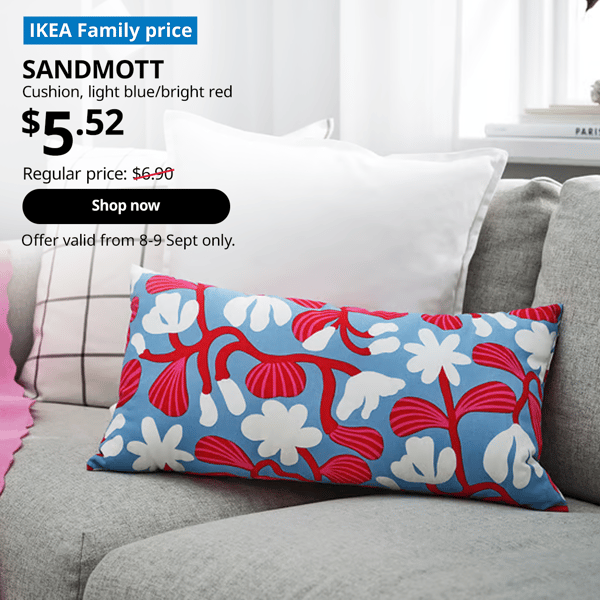A brightly coloured SANDMOTT cushion on a grey sofa. Words on image read "IKEA Family Price, SANDMOTT, cushion, light blue/bright red, $5.52, Regular price, $6.90 with a slash, Add to cart, Offer valid from 8-9 Sept only"