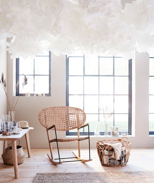 A ceilingful of KRUSNING is impossible to ignore – but will catch your eye in any constellation. A GRÖNADAL rocking chair and a SNIDAD rattan basket completes your cosy corner.