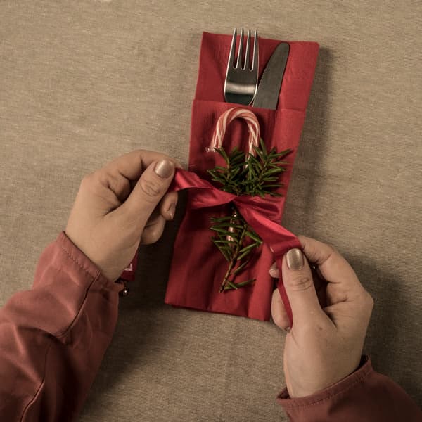 A Christmas tree folded from a green napkin.