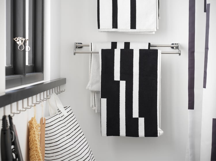 A small, beautiful bathroom with functional storage IKEA