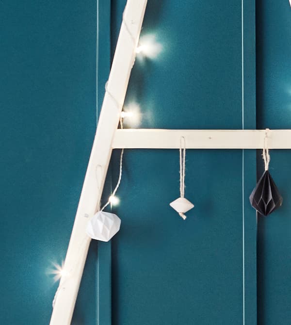 A close-up image of a wooden DIY Christmas tree.