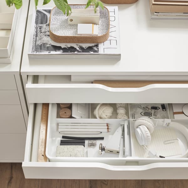 A close up image of the ALEX drawer unit with the drawers open revealing the storage inside.