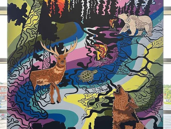 A close up of a large colorful wall mural.