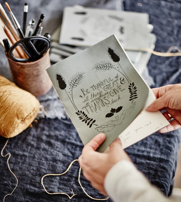 A close-up of a paper dinner program for guests.