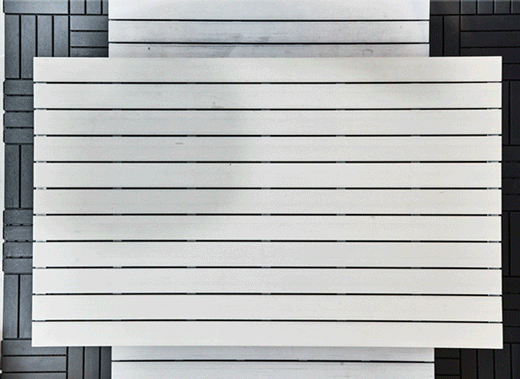 A close up of a plate outline being sewn onto a table cloth and an animated gif showing an outdoor table being covered in a table cloth that looks like a play mat with roads
