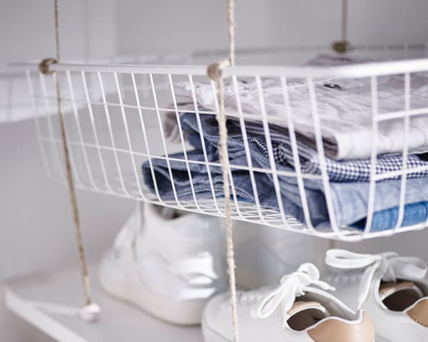 A close up of a wire metal drawer.