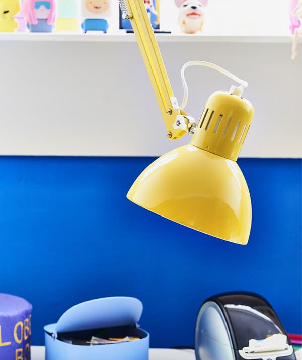 A close-up of a yellow work lamp.