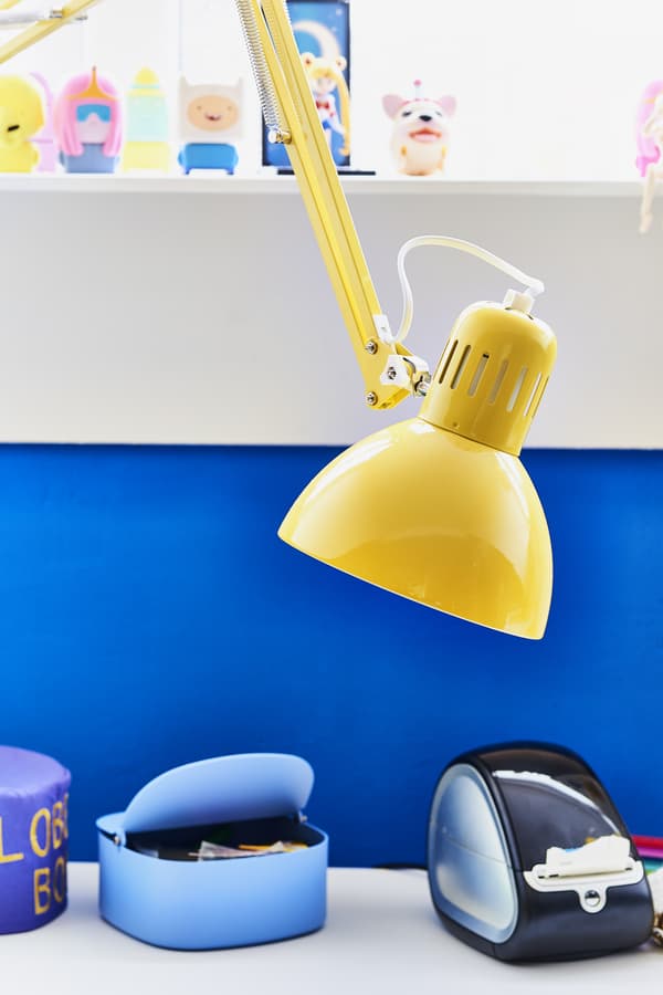 A close-up of a yellow work lamp.