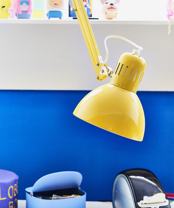 A close-up of a yellow work lamp.