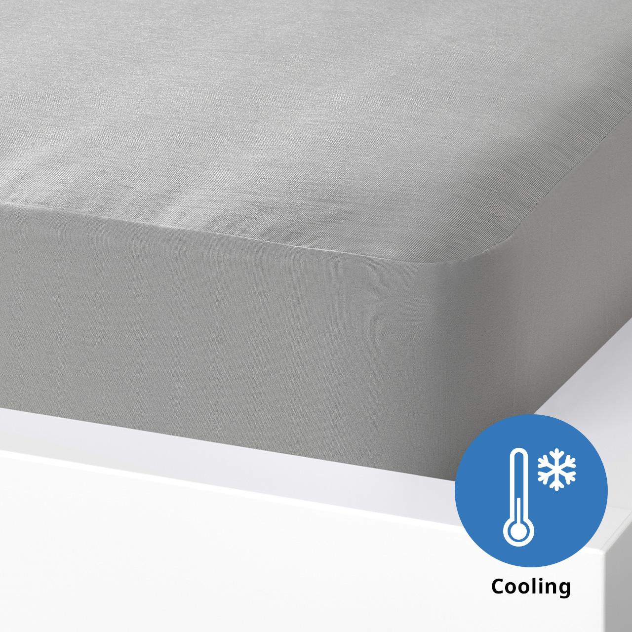 A close-up shot of a grey BRUDBORSTE fitted sheet.