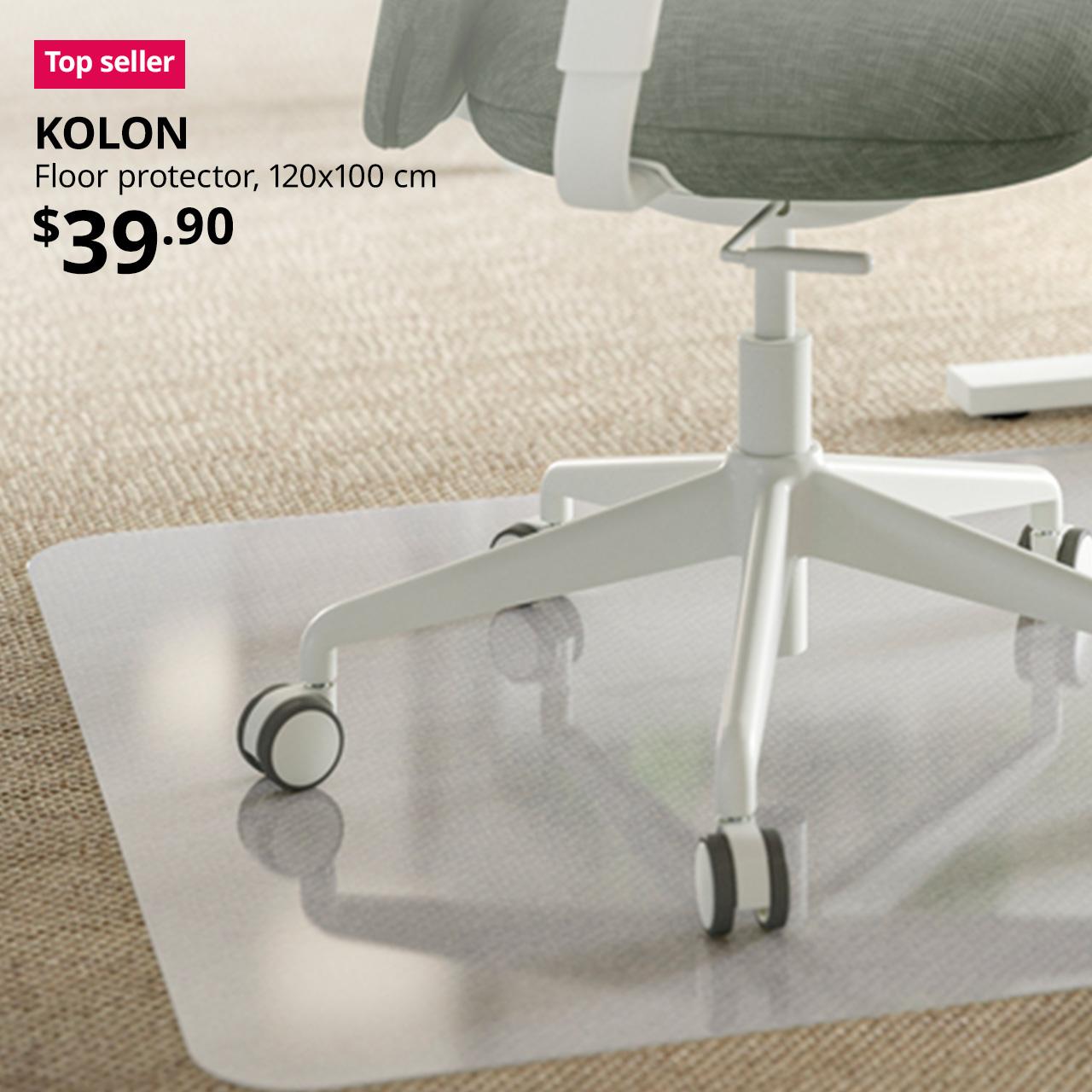 A close-up shot of a office chair on a clear KOLON floor protector. On the top left corner, a red/pink tag with white text that reads 'Top seller', followed by black text overlay image that reads 'KOLON Floor protector, 120x100 cm, $39.90'.