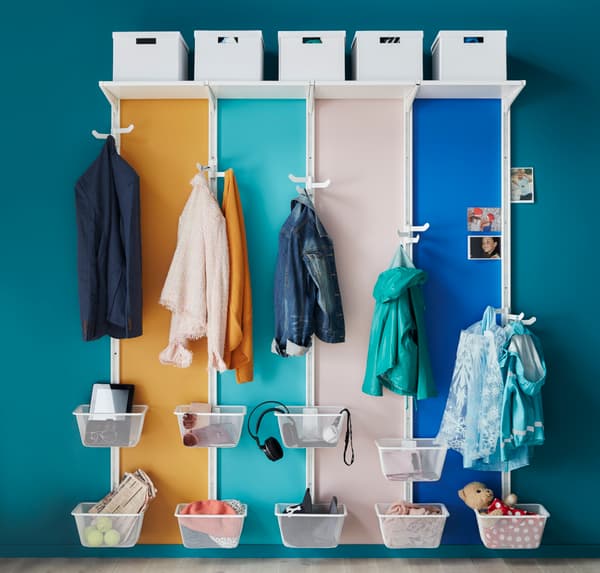 A clothes storage space in the hallway.
