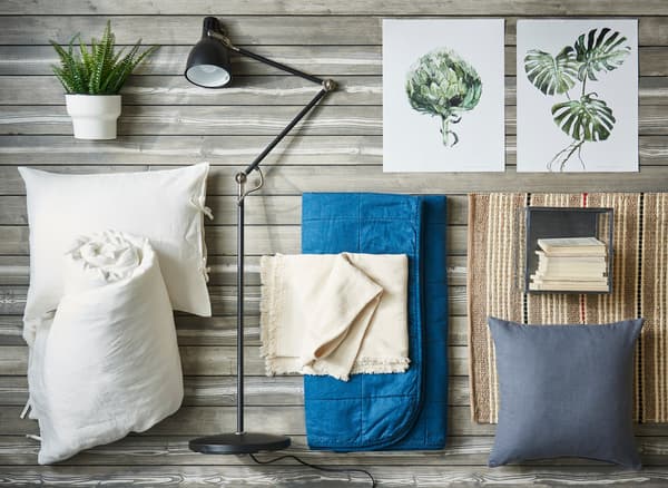 A collage of blue and white textiles and decorative accessories.