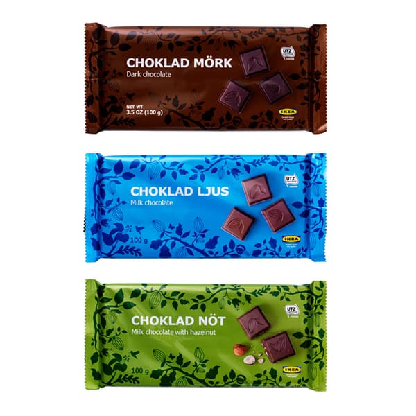 A collage of chocolate bars and candies in various colored packages like blue, green and brown.