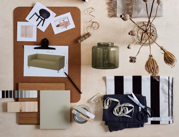 A collage of pictures of furniture, fabric samples, colour chart, pieces of material such as wood.