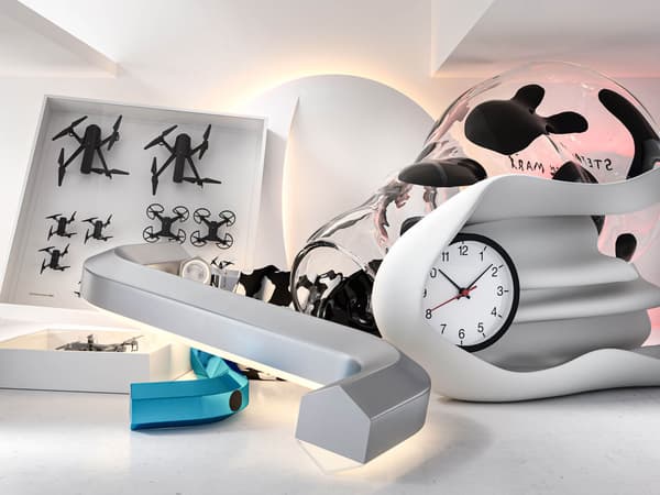 A collection of products from the Art event 2021 collection including a large allen wrench, a stylish clock, and a vase.