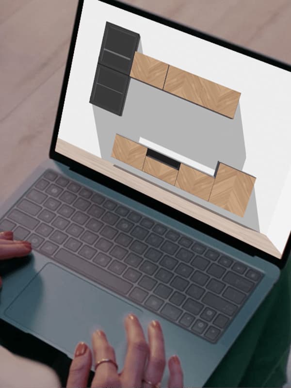 A computer showing someone using the BESTÅ planner.