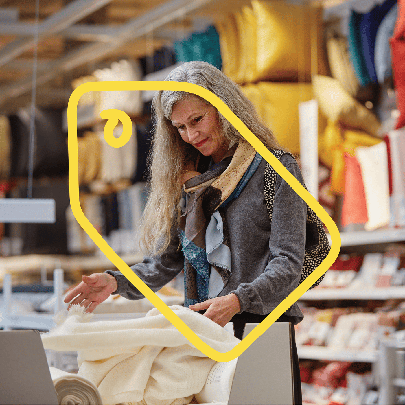 A customer is looking at items in the store and the picture of a price tag is placed over the photo