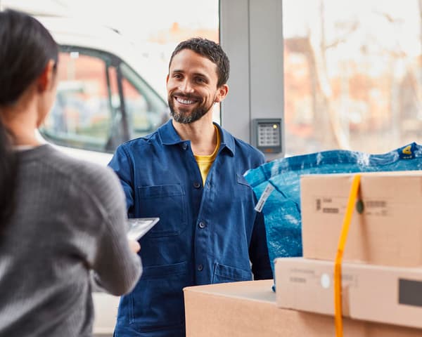 A customer picking up their order from a pickup point