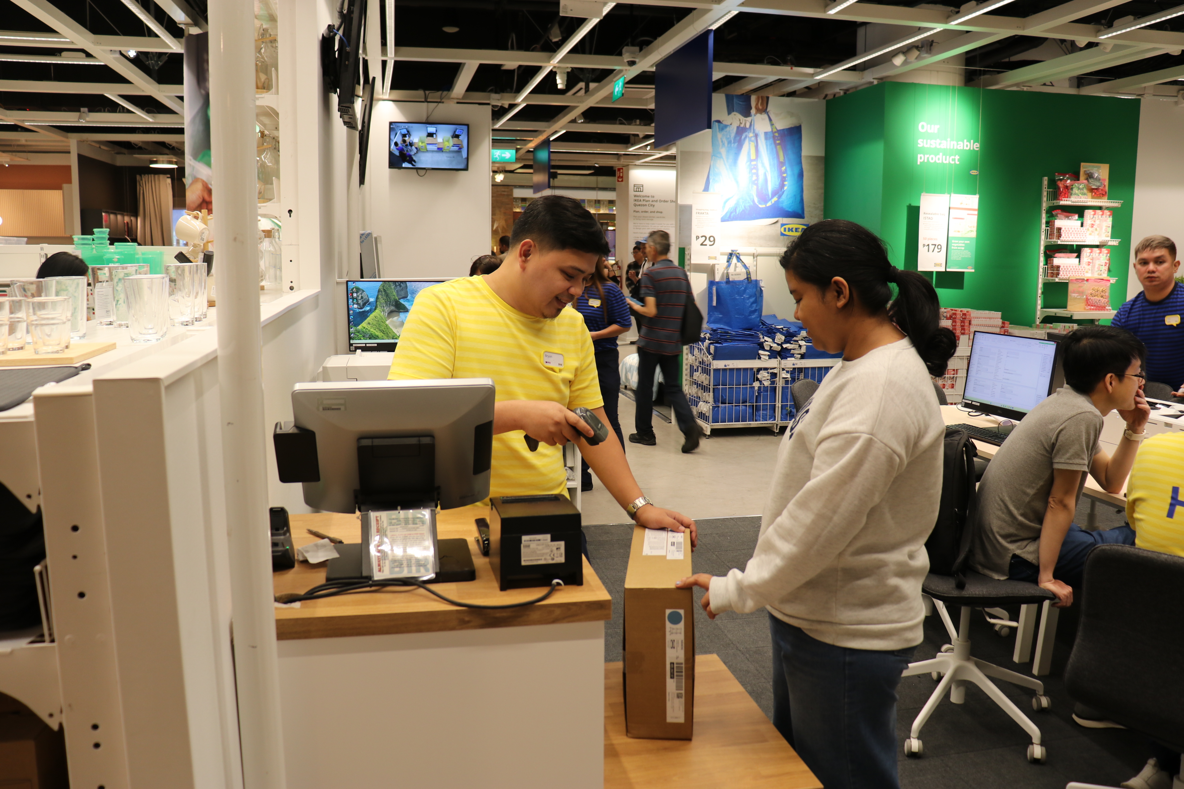 A customer returning an item in IKEA Plan and Order Shop in Quezon City