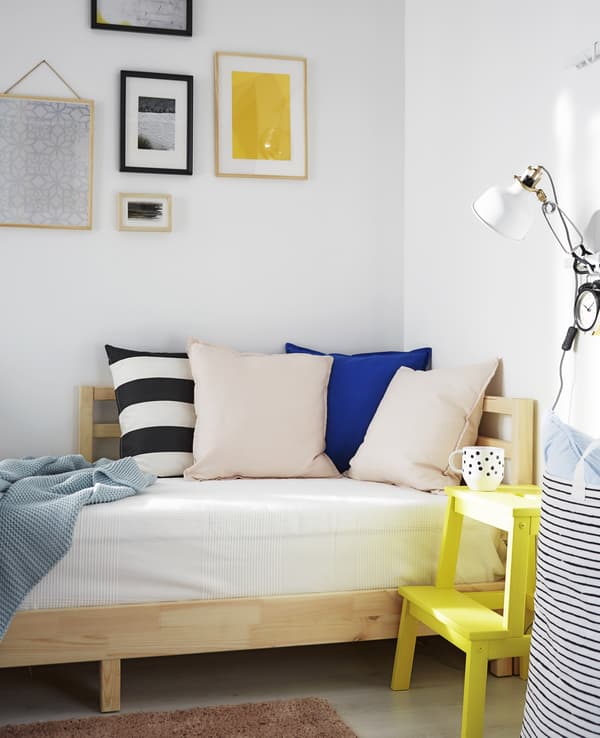A day bed is the perfect solution for a living space that converts to a bedroom at night.