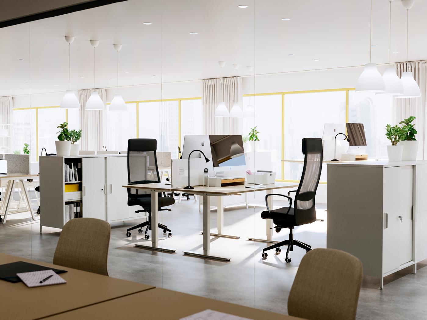 A desk and a desk chair at an office