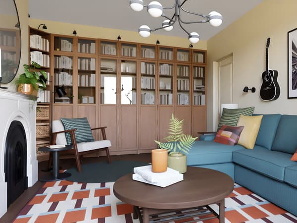 A digitally created image of a living room with yellow walls, a blue sofa, patterned rug with a brown round coffee table and bookshelves in the back