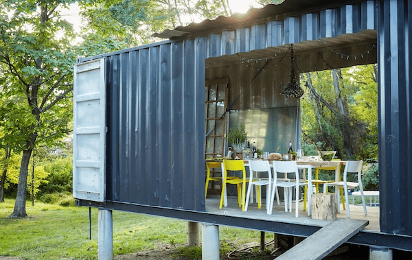 A dining room in a shipping container.