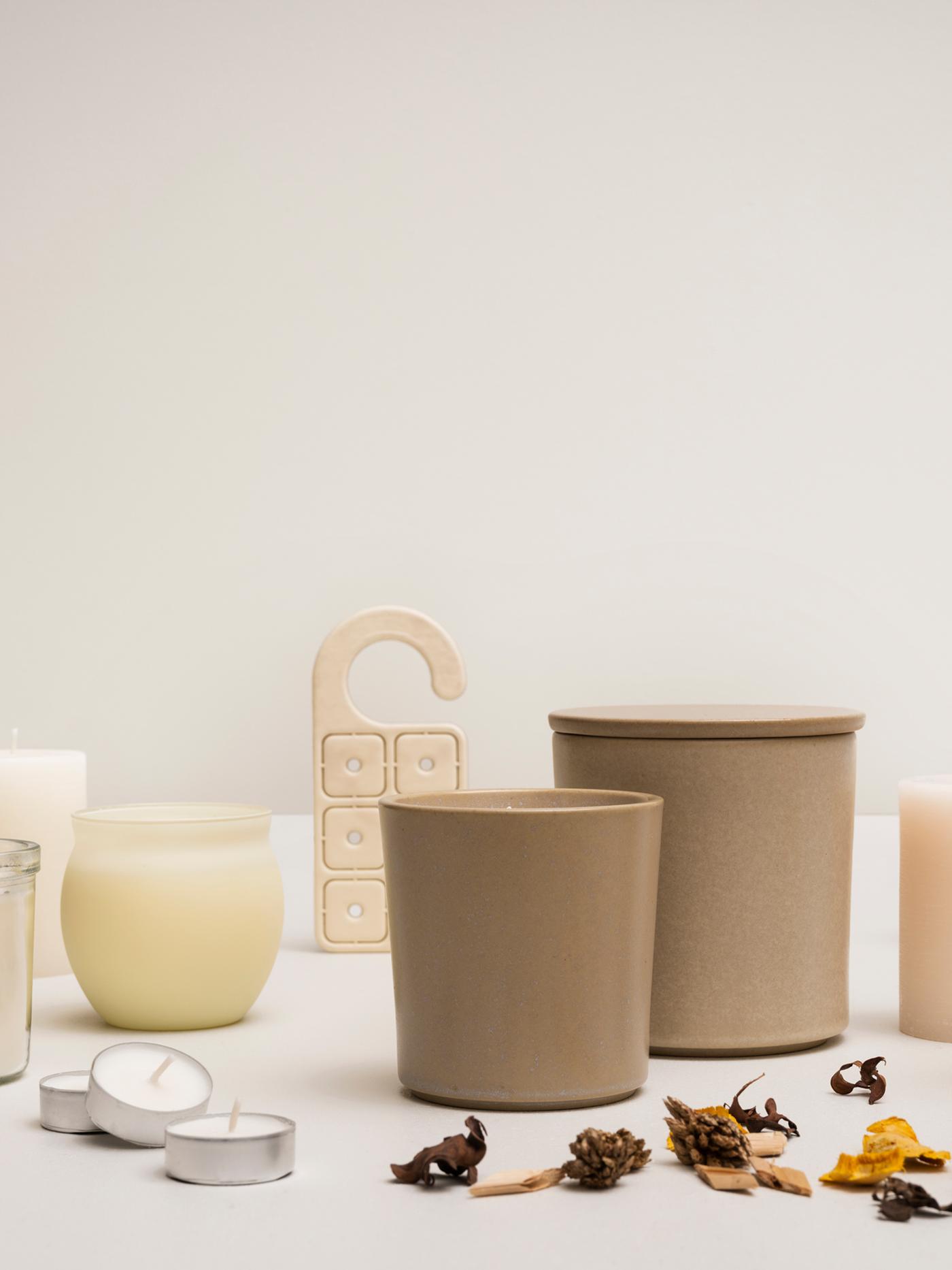 A display of several JÄMLIK vanilla scented candles, potpourri and a scented hanger against a white background.