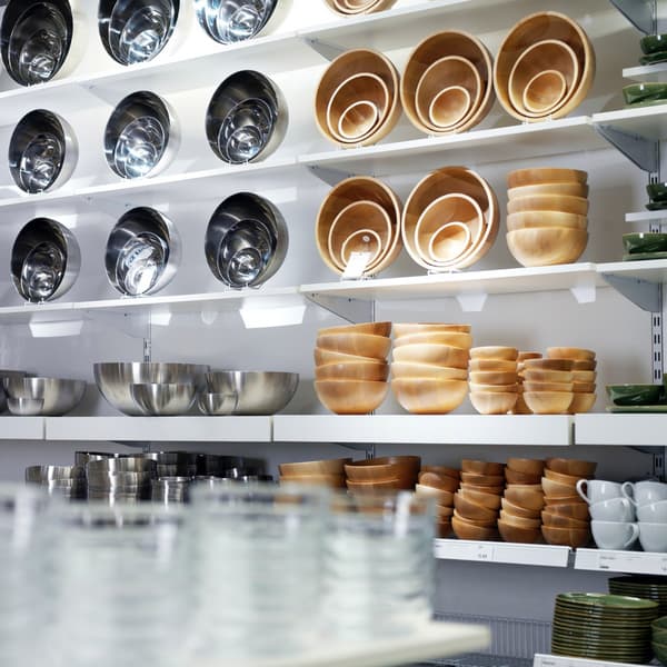 A display wall in Market Hall featuring a combination of stainless steel and bamboo bowls.