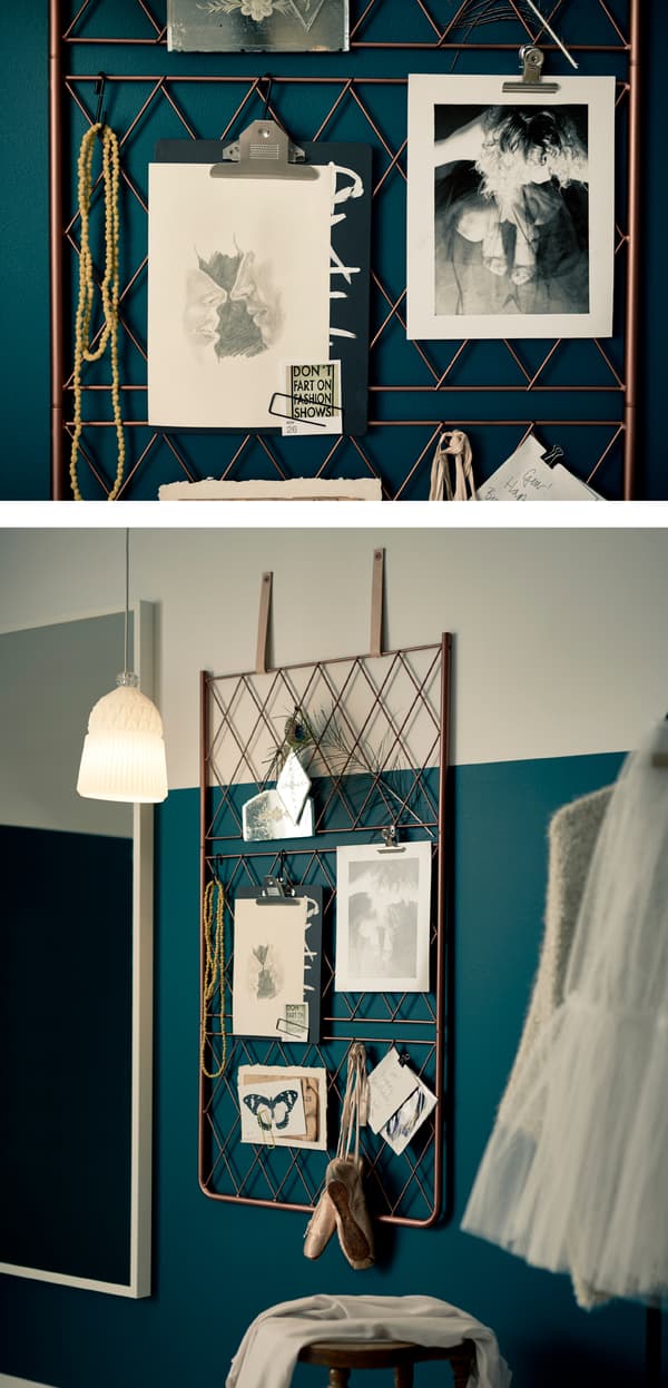 A DIY metal wire inspiration board hanging by leather straps on a wall