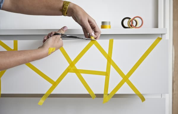 A drawer decorated with washi tape.