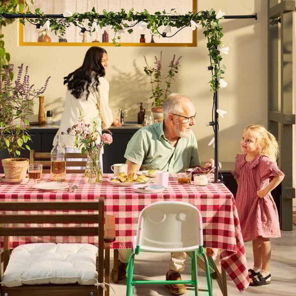 A family celebrating outdoors