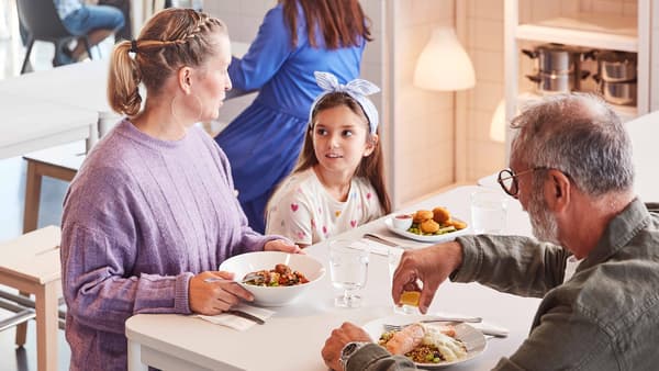 A family enjoying a meal at an IKEA restaurant