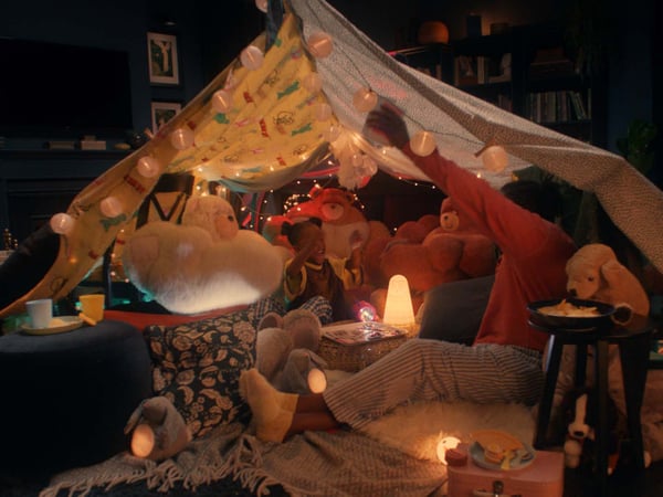 A family gathered in their own safe-haven, protected by their "brawny bears"