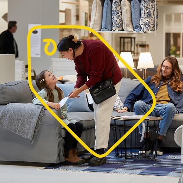 A family shopping at IKEA. 