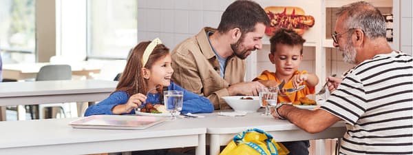 A family sitting and enjoying the meal at IKEA Restaurant