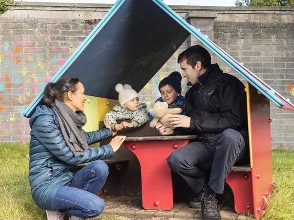 A family together in a play house