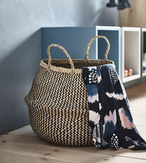 A FLÅDIS basket being used as a lost-and-found collection spot to organise a shared house.