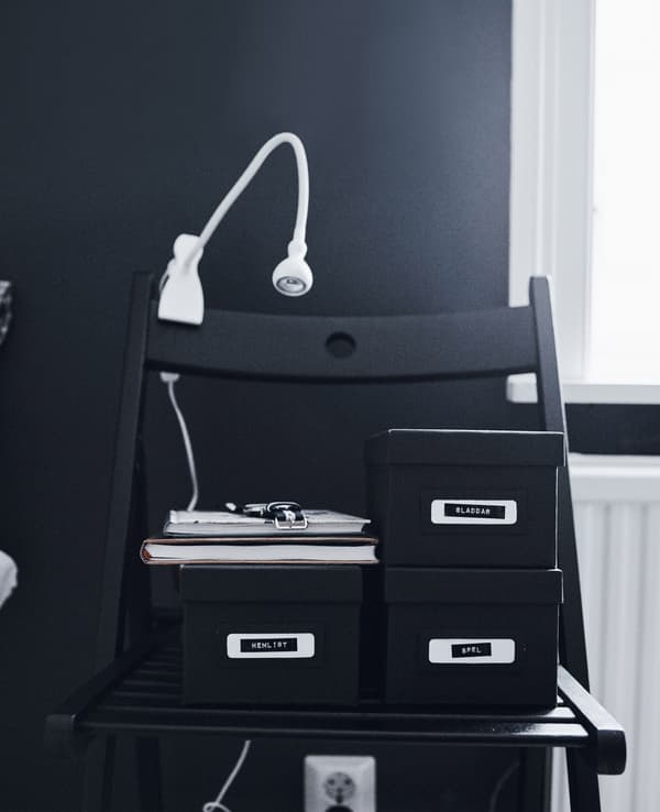 A foldable chair can double as a bedside table