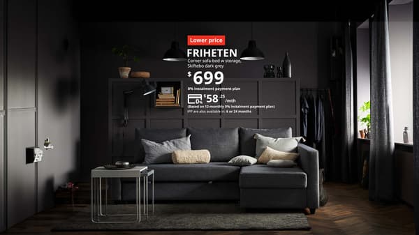 A FRIHETEN corner sofa-bed in dark grey, priced at $699 but now can be paid for $58.25  per month for 12 months. Lower price tag.