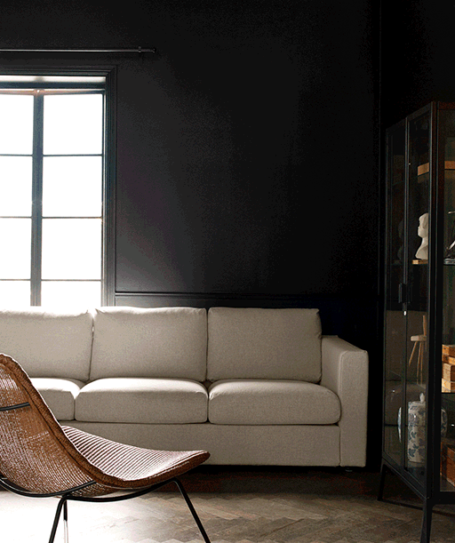 A GIF showing a living room transforming as IKEA home furnishing items are added to the room.