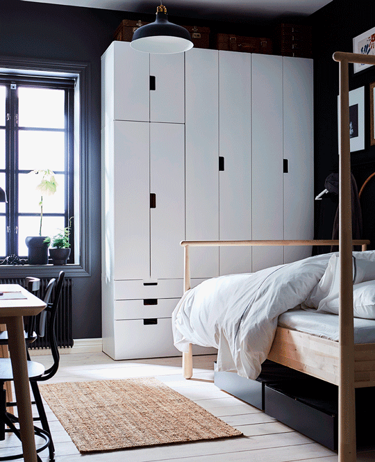 A GIF showing wardrobes doors opening and closing to reveal separate storage for a child and a parent in a shared room